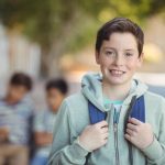 Boy student looking at camera